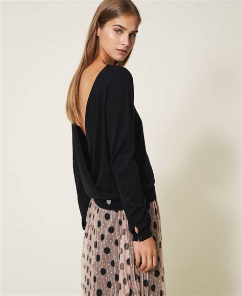 Top cropped in maglia di seta in Nero 